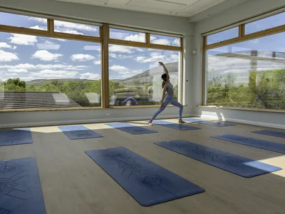 Girl practicing in Burren yoga studio | Retreat venue
