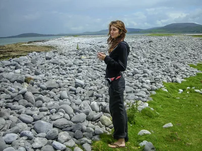 Girl relaxing and looking out to sea | Burren Guided Walks