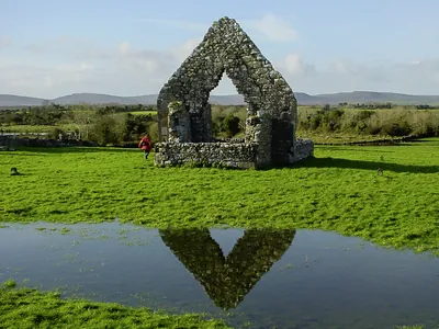 Old ruin part of Kilmacduagh monastery in the Burren 1 | Retreat Venue Hire Ireland