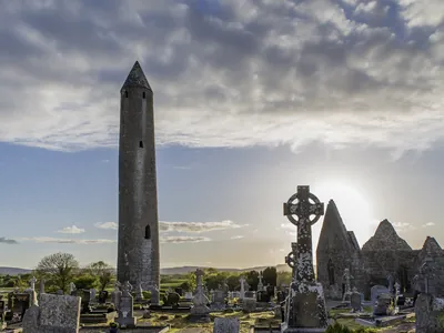 Sunset over Kilmacduagh round tower 1 | yoga teachers retreat