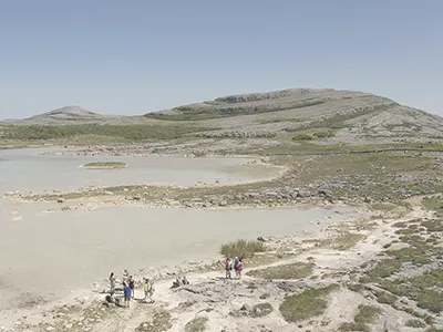 Aerial Mullaghmore group standing at water 1 | Retreat Venue Hire Ireland