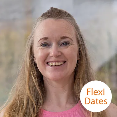 a woman smiling for a picture