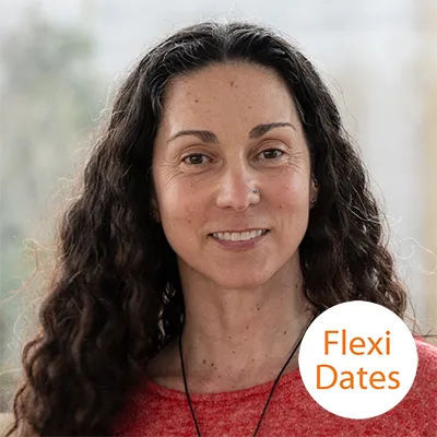 a woman with long hair smiling