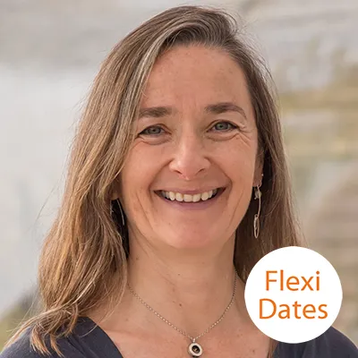 a woman smiling for a picture